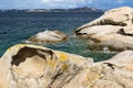 Colourful Granite Coastline & Isola Caprera With Blue Sky Ã¢â¬â Baia Sardinia, Costa Smerelda, Sardinia, Italy. Royalty Free Stock Photo